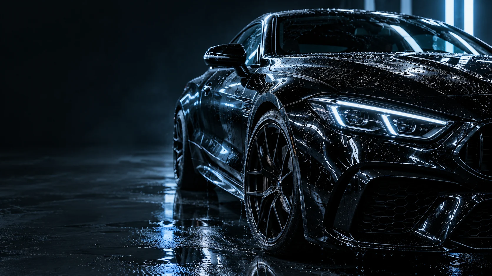 Freshly washed black performance coupe with blue reflections